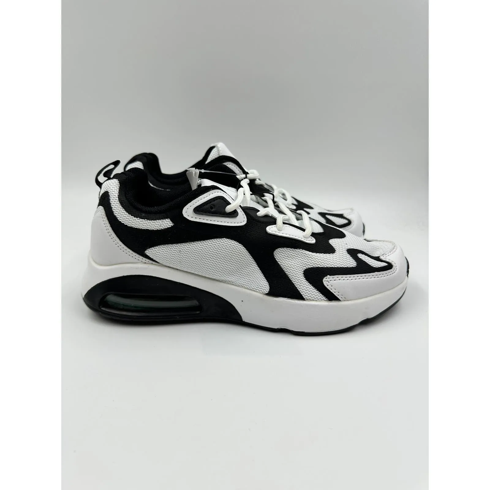 Women's Size 7, White and Black Mesh Upper with White and Black Air Heel