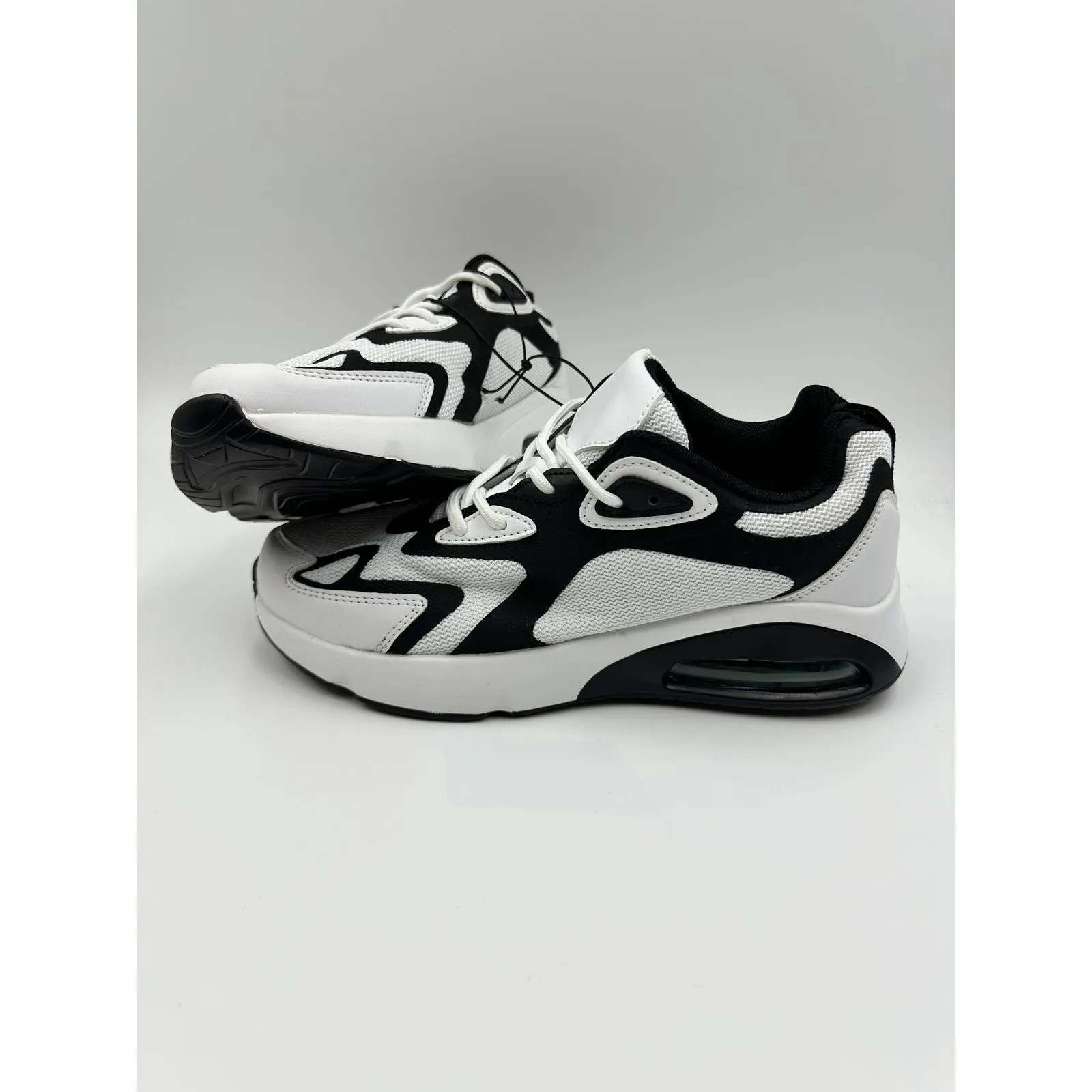 Women's Size 7, White and Black Mesh Upper with White and Black Air Heel